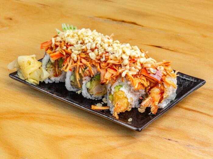 Crazy Shrimp Roll featuring double shrimp tempura, crab, spicy crab mix, cucumber, and crunch topping.