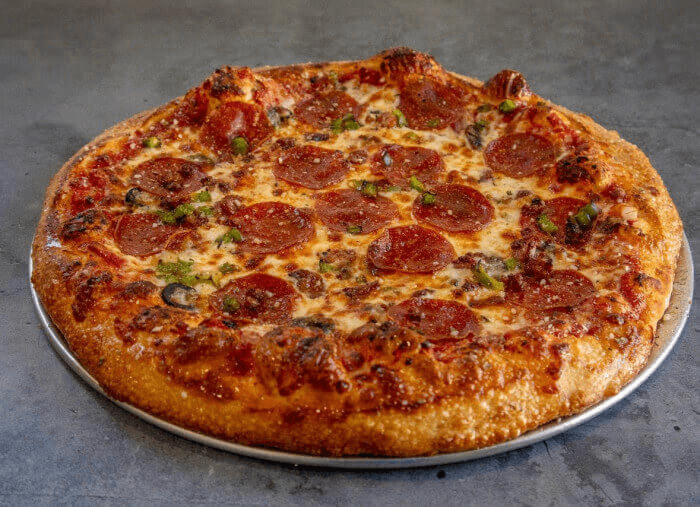 Pepperoni and cheese pizza with golden melted mozzarella and tomato sauce