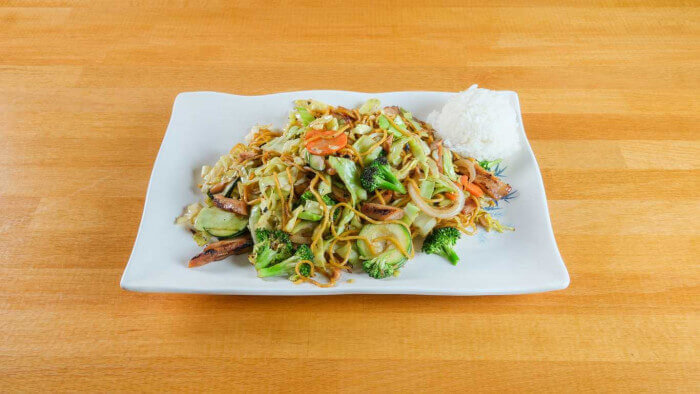 Chicken yakisoba noodles on ceramic plate