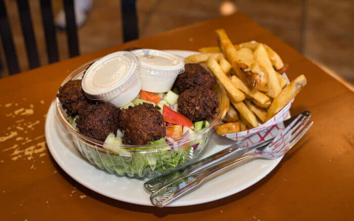 Crunchy falafel on chopped salad