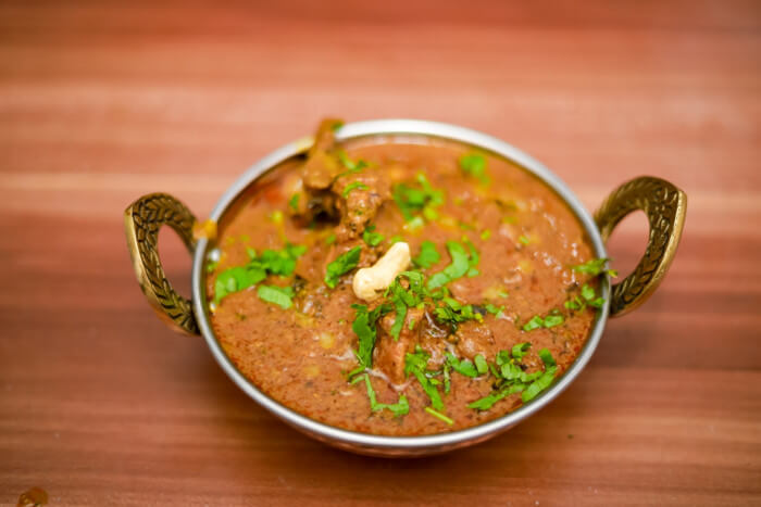 Chicken Saag dish served at Taz Grill N Bar near Nederland TX
