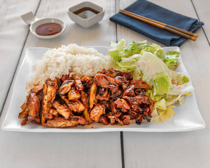 Extra portion of juicy, charbroiled chicken with rice and salad