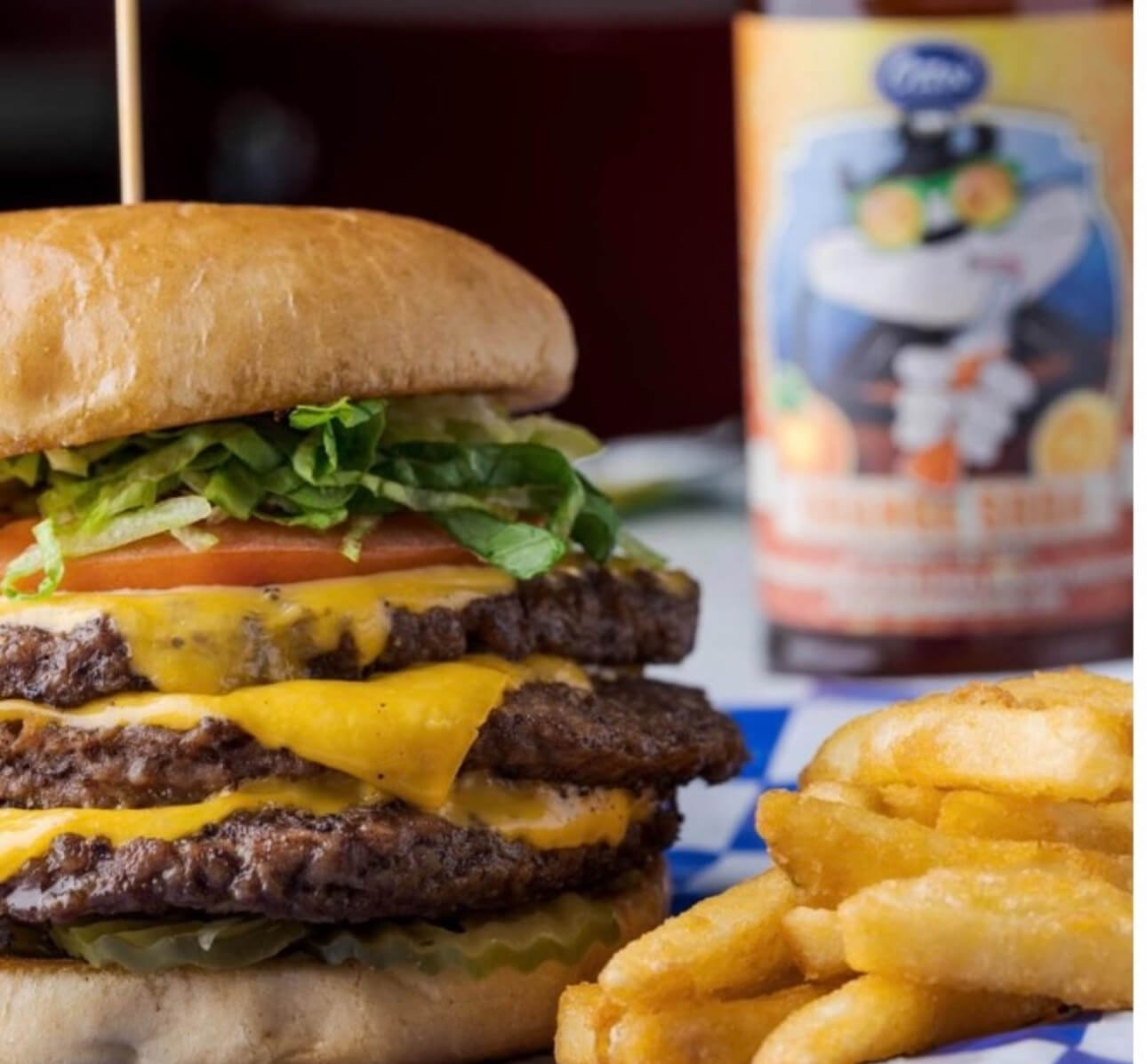 American Classic Burger with fries near The Trails TX
