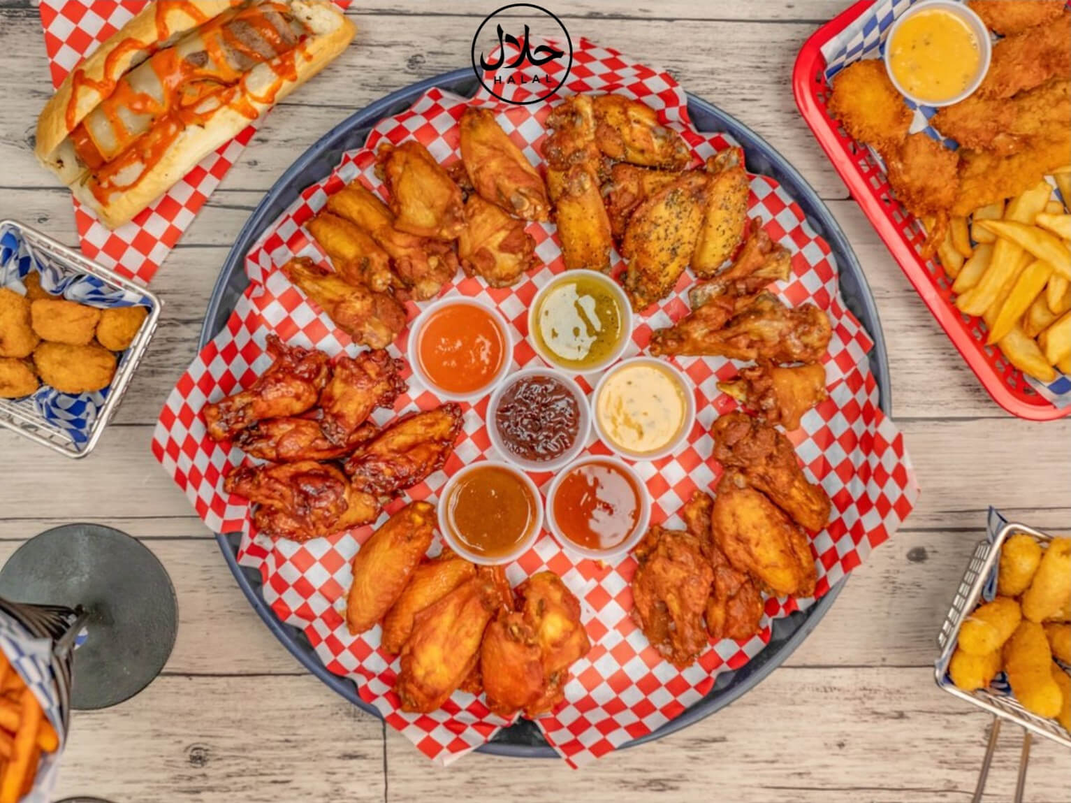 Golden fried wings, sauces and bite-sized catfish nuggets